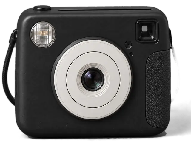 An instant camera with a photo of Camille coming out of its slot